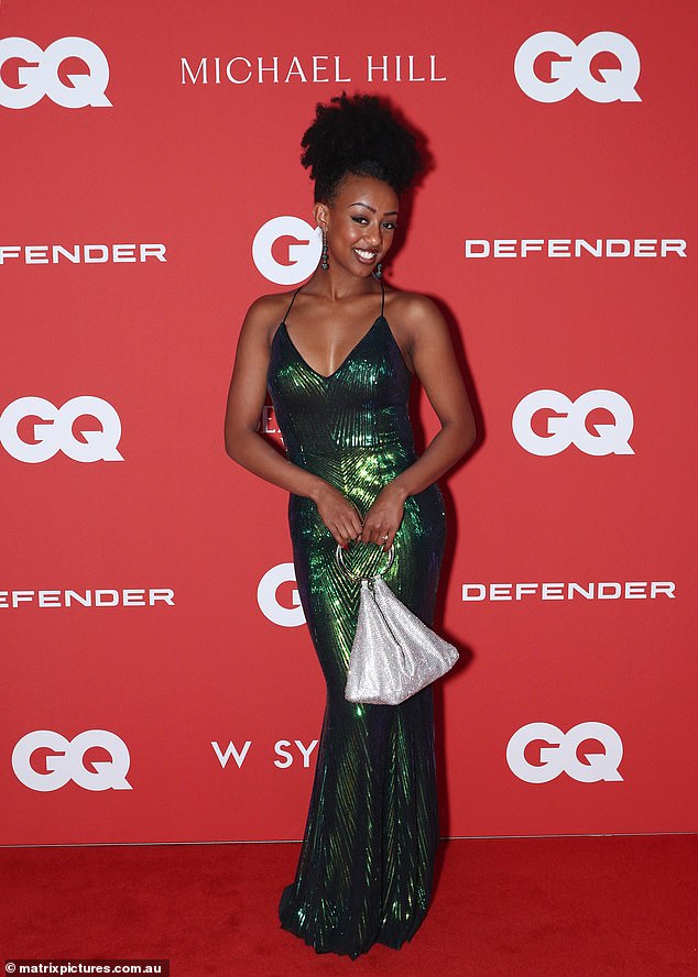 Tsehay Hawkins swapped her yellow skivvy for a slinky green number with spaghetti straps