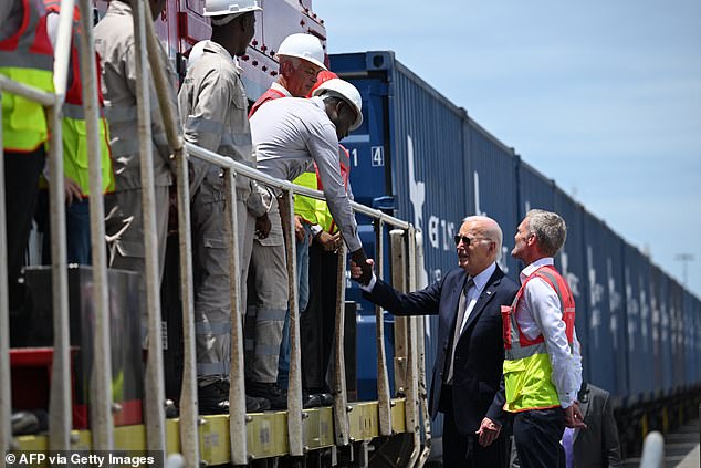 President Joe Biden meets employees of Lobito Atlantic Railway (LAR) with Director of Operations (COO) at LAR Nicolas Gregoir at the Port in Lobito