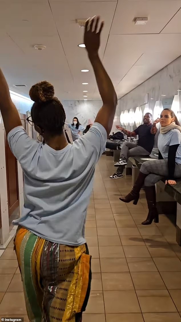 Video of the demonstration starts with a panorama of the interior of the Capitol building entrance, then turns into the nearby restroom that is filled with a dancing group