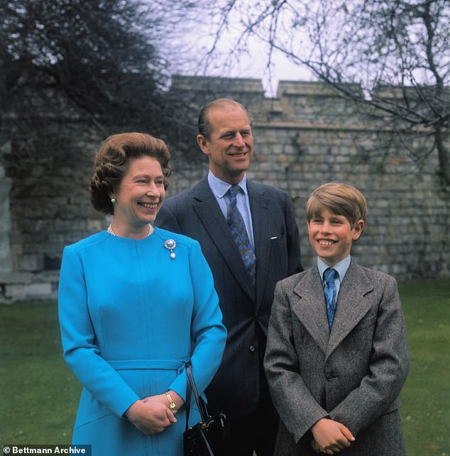 The Queen, Prince Philip and Edward smiling together in 1976