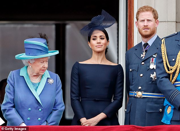 A royal expert has claimed Harry and Meghan are disliked by Americans because 'they hate that they let the Queen down'. Pictured together on the balcony of Buckingham Palace in 2018