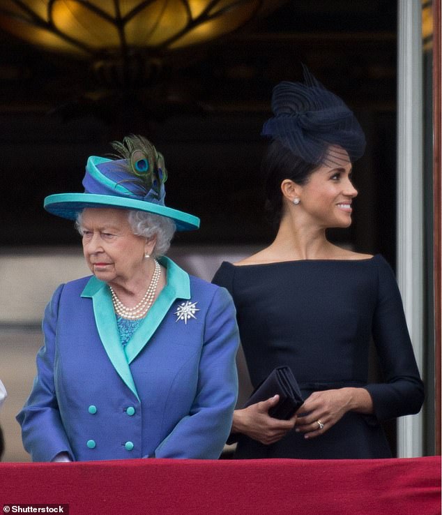 The late Queen and Meghan on the balcony of Buckingham Palace for the 100th Anniversary of the Royal Air Force on July 10, 2018