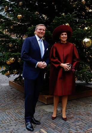 Queen Maxima of the Netherlands strikes a festive chord in all-red ensemble as she visits