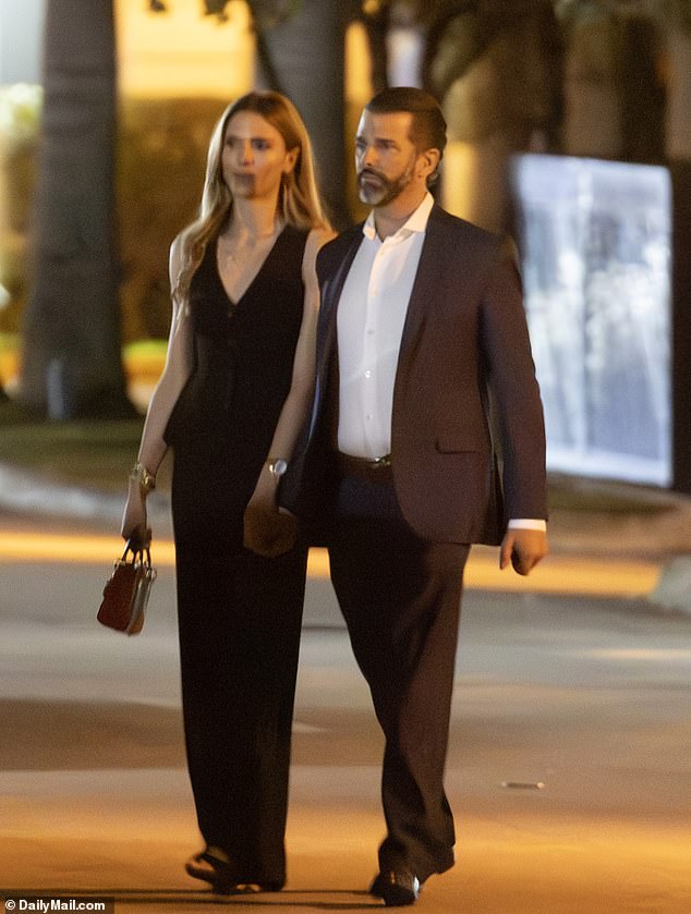 Allies in MAGA world are worried about the 'liability' that Donald Trump Jr.'s new girlfriend Bettina Anderson poses and say they aren't sure the president-elect's base will embrace her. Pictured: Anderson and Trump walk hand-in-hand as they leave a restaurant in Palm Beach, Florida on Monday, December 9