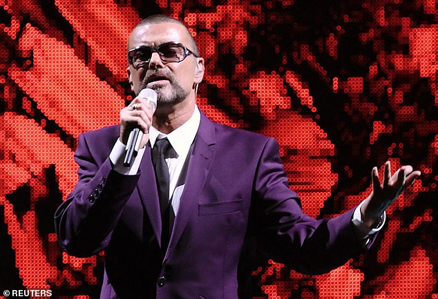 George Michael, seen here performing on stage in Vienna in September 2012, is said to have made spontaneous donations worth thousands of pounds to people struggling with debts