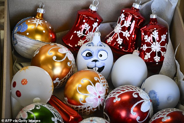 Christmas decorations could harbour five times as many germs as the average toilet seat, swab tests of items including trees, wreaths and lights have revealed