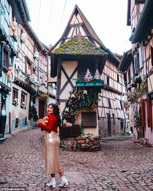 Jackie is pictured above in Eguisheim, which she described as 'very picturesque'