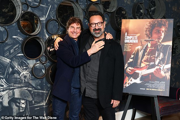 Tom warmly embraced the director