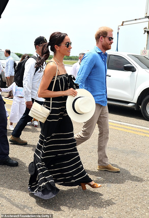 Meghan Markle was a marvel in monochrome as she arrived in Cartagena with Prince Harry on the third day of their tour of Colombia