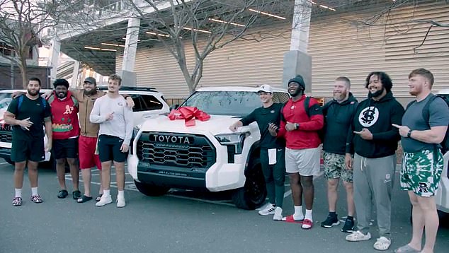 The 49ers released a clip of Brock Purdy (fifth from right) treating his O-line to Toyota trucks