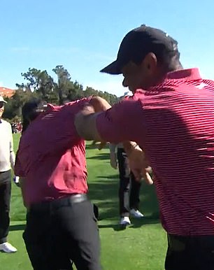 Tiger was first on the scene to celebrate with his son