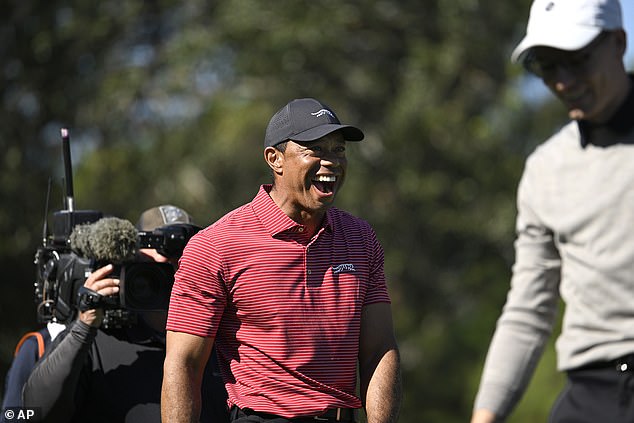 Tiger couldn't believe his eyes, with the pair fighting right at the top of the leaderboard