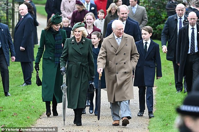 Both Queen Camilla and King Charles carried umbrellas as they walked