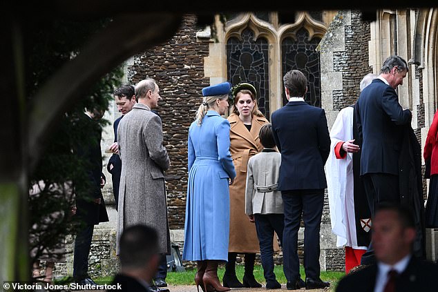 They gathered at the church before going in for the service, which started with the National Anthem