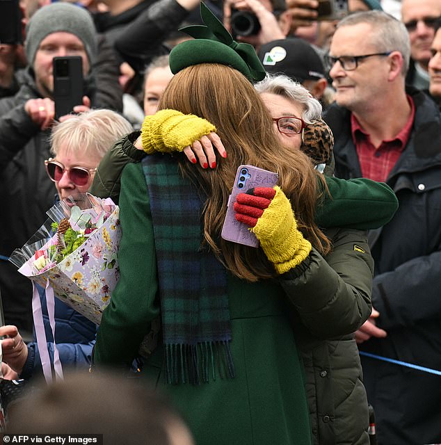 The Princess of Wales hugged a cancer patient (pictured) after a Christmas Day service today