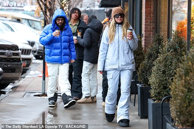 The duo were spotted holding hands and sipping on a warm cup of coffee as they bundled up to beat the freezing temperatures