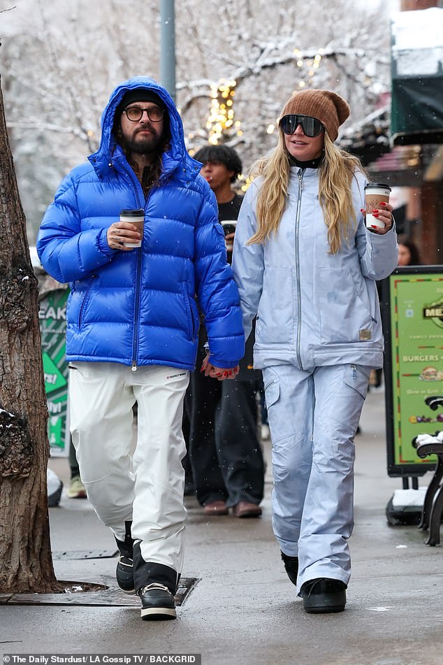 The 35-year-old guitarist wore a blue puffer jacket and white snow pants as the duo enjoyed the up-scale getaway