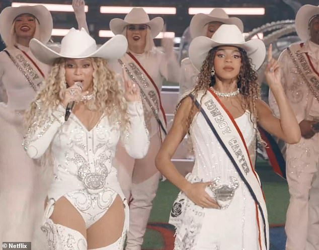 Beyoncé Knowles-Carter's eldest child - daughter Blue Ivy Carter - eclipsed her 5ft6in frame while dancing side by side during the epic NFL halftime performance at NRG Stadium in her Houston hometown on Christmas day