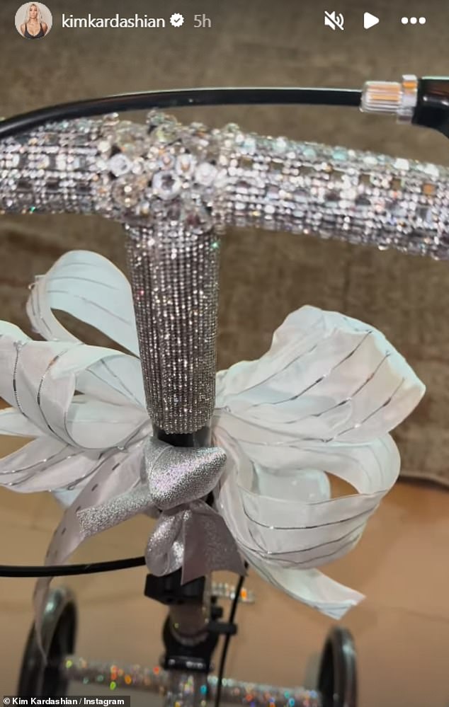 In one reel uploaded to her stories, Kim filmed the new scooter that was decked out with sparkling, silver rhinestone details