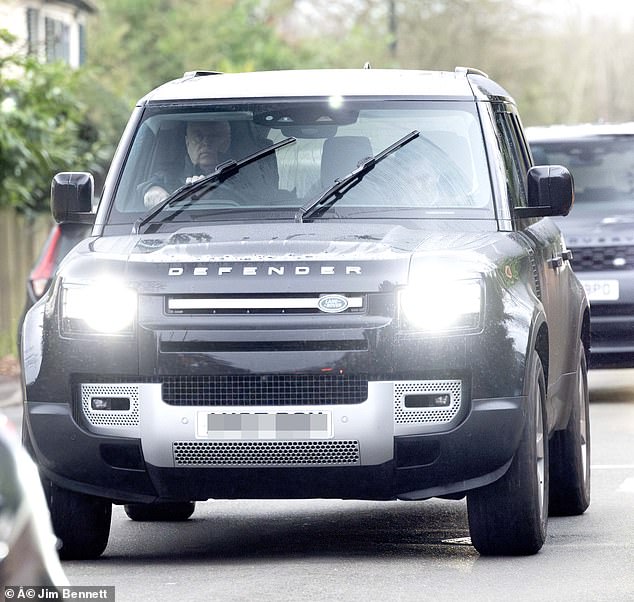 Prince Andrew appeared solemn as he was seen out for a drive on Boxing Day - after deciding to opt out of festive celebrations at Sandringham with his family