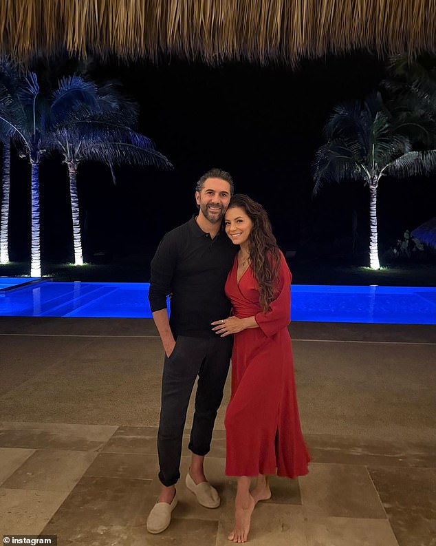 In one of the other snaps, Eva cuddled up with her hunky husband by the pool as she donned a red midi dress as her dark locks cascaded down her shoulders