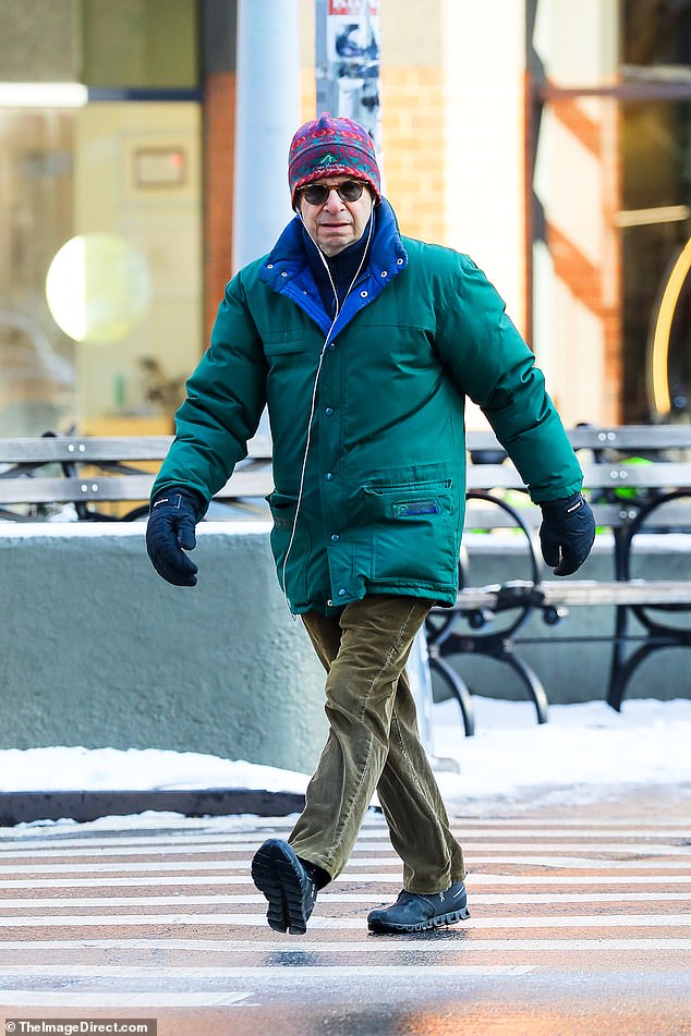 He sported an insulated jade green jacket over olive green trousers and black boots as the outing comes nearly 30 years after he left acting in 1997