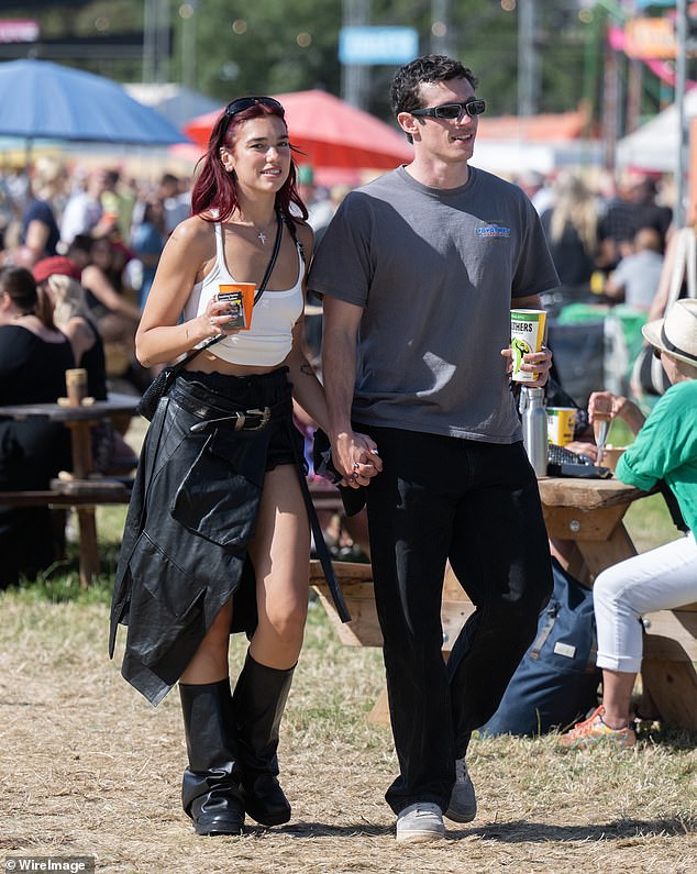 In June, the couple looked completely smitten as Callum wrapped his arms tightly around Dua as she relaxed at Glastonbury Festival in Worthy Farm after headling the Pyramid Stage