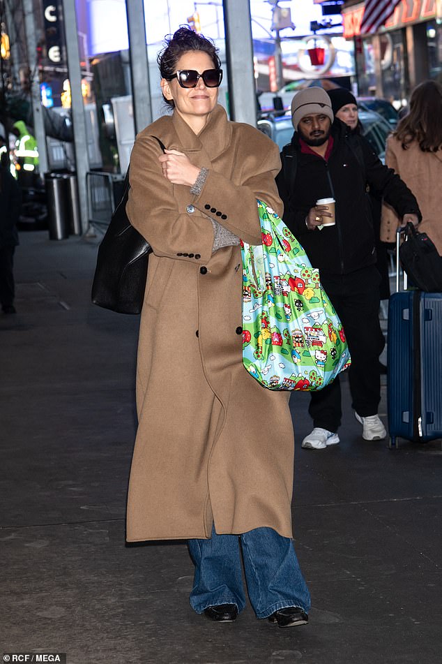 Katie Holmes was spotted returning to Broadway's Our Town on Thursday after enjoying a brief Christmas break