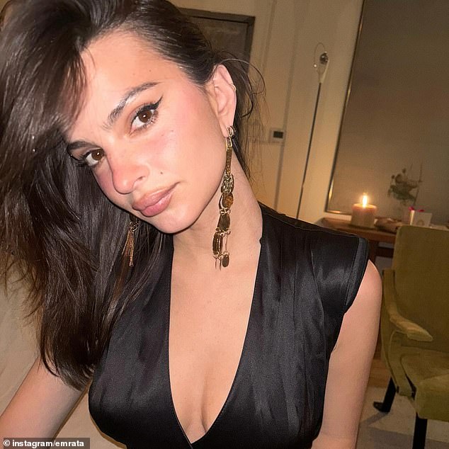 Emily Ratajkowski, 33, put on a busty display in a sultry snap for an Instagram roundup as she reflected on her busy and festive month of December