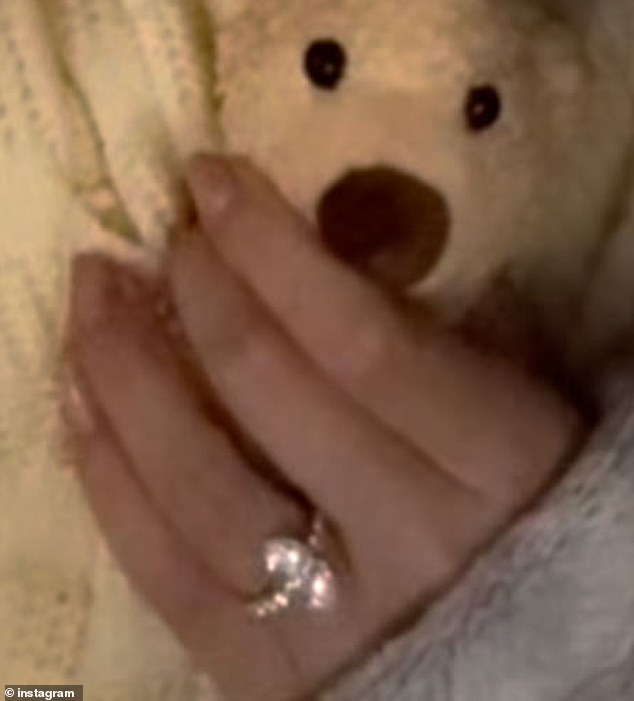 Gomez's engagement ring was in clear view as she held onto an adorable stuffed teddy bear in her left hand