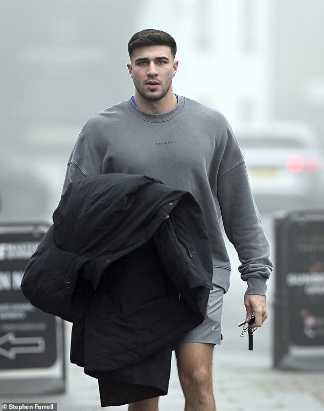 The boxer, 25, sported a grey jumper and matching shorts as he left the salon after spending his first Christmas without ex-fiancée Molly-Mae Hague