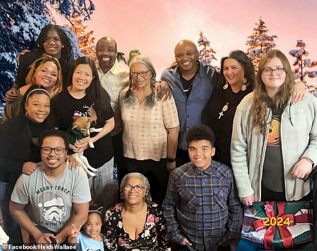 The family got together over Christmas and took a fabulous family photo with Sandra at the center of it all