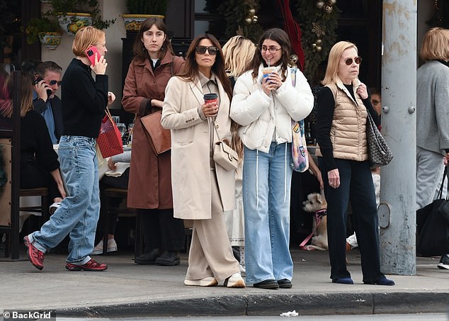 The Desperate Housewives alum, 49, teamed a stylish beige co-ord with her ensemble as she and her 21-year-old stepdaughter enjoyed a quick coffee break