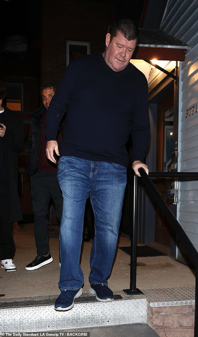 The 57-year-old dressed casually in a navy blue jumper that sat close to his slimmed down form. The former Crown Resorts chairperson added a pair of blue jeans and sneakers