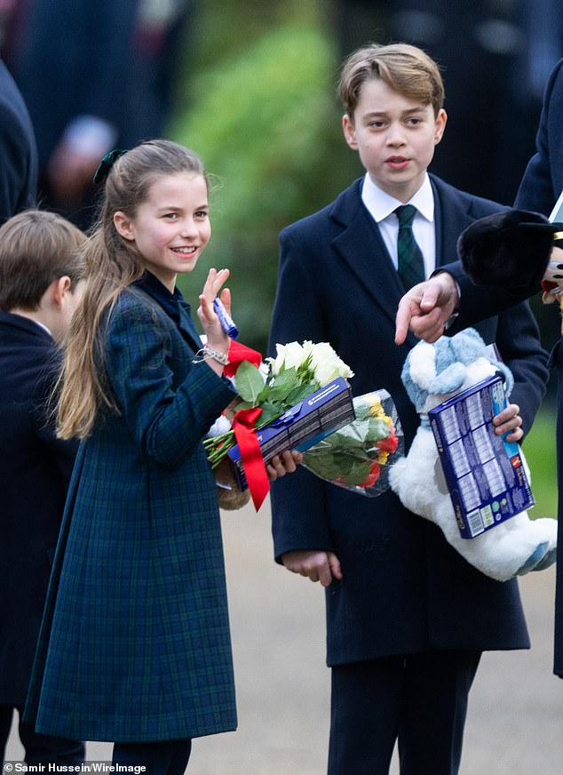 As members of the royal family descended on the Sandringham estate on Christmas Day, they were met with swathes of doting royal fans handing out chocolate, flowers and gifts. Pictured: Princess Charlotte, left, and Prince George, right