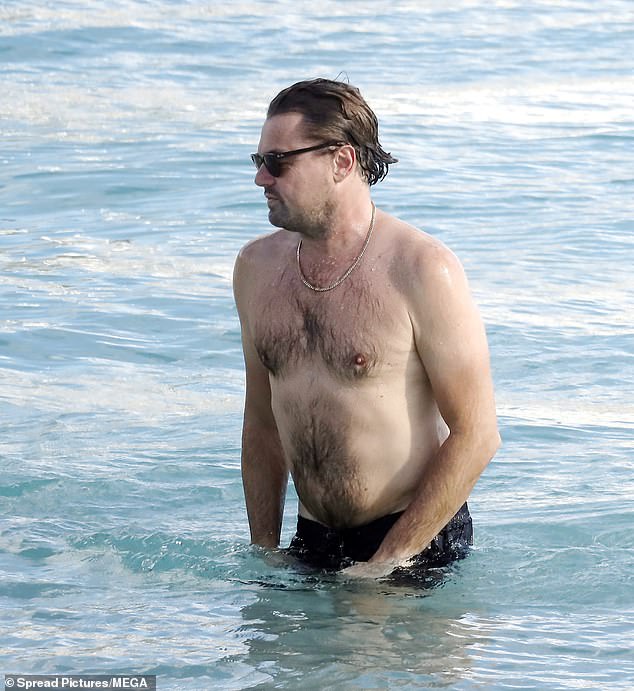 Meanwhile, Leonardo showcased his hairy chest with a gold chain necklace and sported a pair of black swim trunks