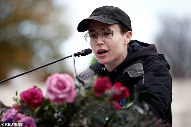 Many online users quickly noted that the actor spoke in a dull manner and appeared to look sad, leading them to believe he truly isn't happy with his transition. (Pictured: Page speaking outside of the U.S. Supreme Court on December 8)