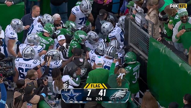 Several players eventually intervened near the tunnel as Sunday's game ended in chaos