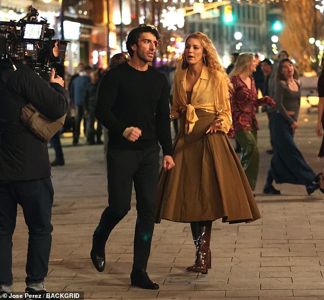 It appears the hostility between Blake Lively, 37, and Justin Baldoni, 40, will not end with 2024, as a lawyer for Baldoni vows a forthcoming countersuit against the actress 'is going to shock everyone.' Pictured on set in NYC earlier this year