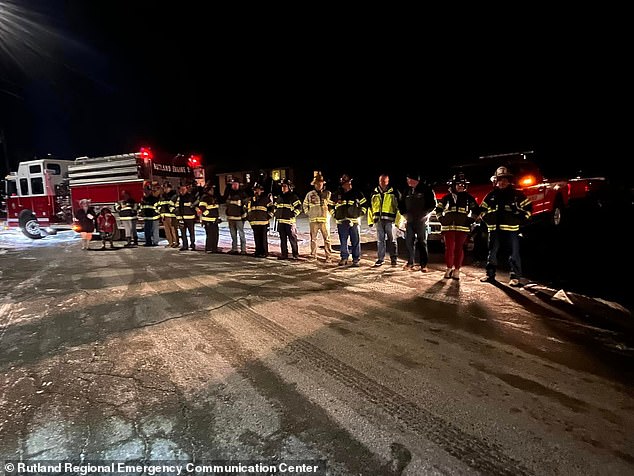 Sullivan's colleagues at the fire department lined up on the street to support him as he returned home following the deaths of his wife and twins