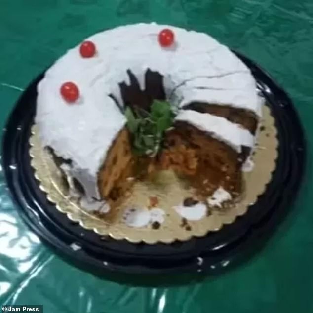 Pictured: The Christmas cake that was consumed by guests on December 23