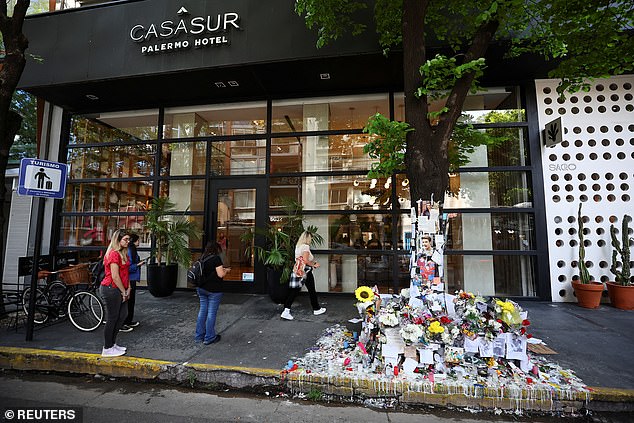 Tributes left outside the CasaSur Palermo Hotel in Buenos Aires where Liam died on October 16 after falling from the third-floor balcony of his suite