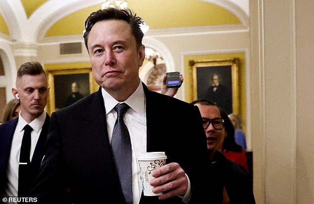 Elon Musk walks on Capitol Hill on the day of a meeting with Senate Republican Leader-elect John Thune (R-SD), in Washington, U.S. December 5, 2024