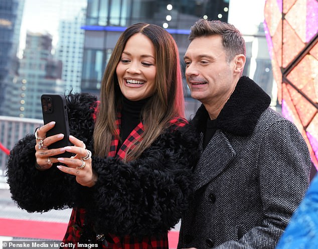 Ryan and Rita posed for selfies while at a pre-show event on Monday