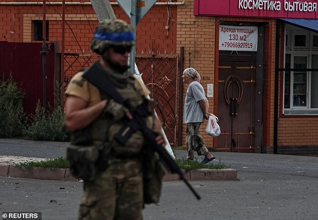 A Ukrainian soldier in the Ukraine-controlled town of Sudzha in the Kursk region of Russia. The troops face being ejected from the Russian province they invaded earlier this year - in a major blow for their country