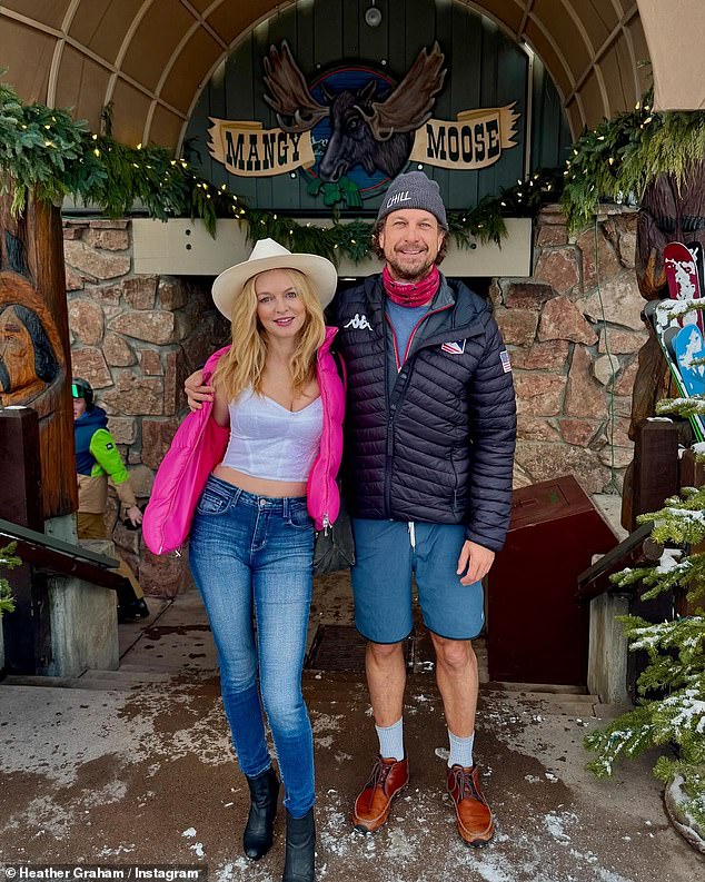 The Austin Powers star, 54, jetted off to snowy Jackson to learn to ski over the Christmas holidays with her snowboarder boyfriend John de Neufville (Pictured)