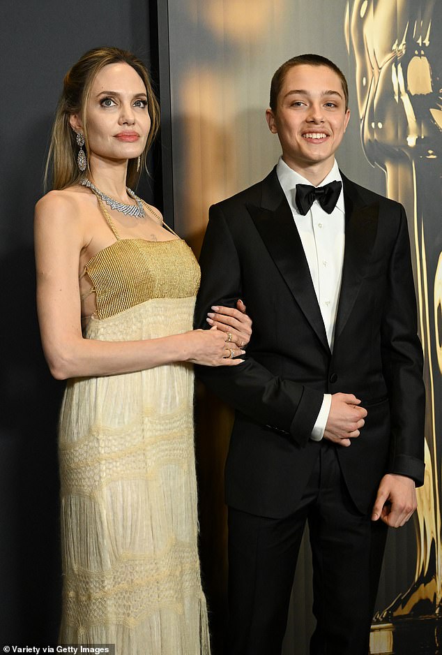 Jolie filed to end the marriage in September of 2016, just two years after tying the knot. She and her son Knox are pictured together in November 2024