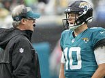 Jacksonville Jaguars head coach Doug Pederson, left, talks to quarterback Mac Jones (10) during the first half of an NFL football game against the Tennessee Titans, Sunday, Dec. 29, 2024, in Jacksonville, Fla. (AP Photo/John Raoux)