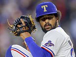 FILE - Texas Rangers relief pitcher Grant Anderson winds up during the eighth inning of a baseball game against the Detroit Tigers, June 4, 2024, in Arlington, Texas. (AP Photo/Gareth Patterson, File)