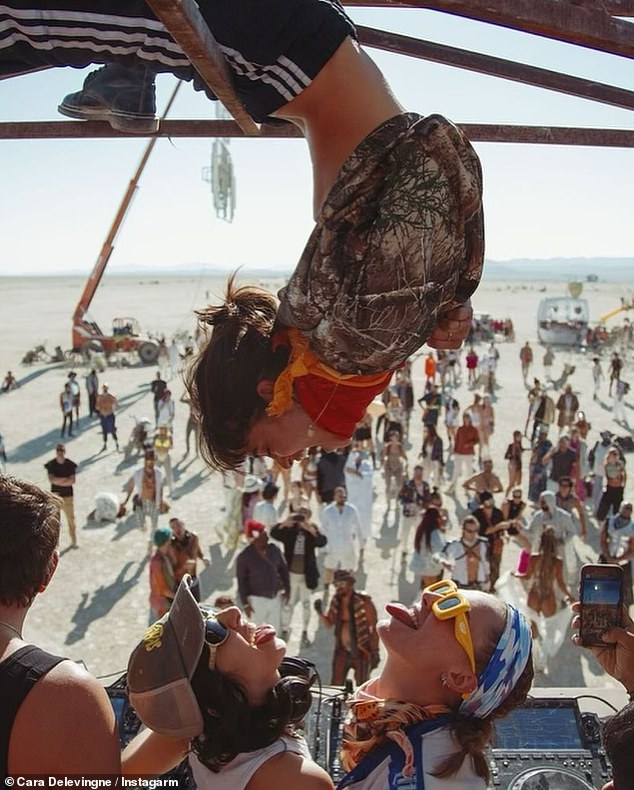 One picture showed her friend hanging from a railing at the beach